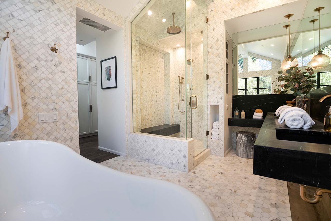 Standing tub and shower in elegant bathroom