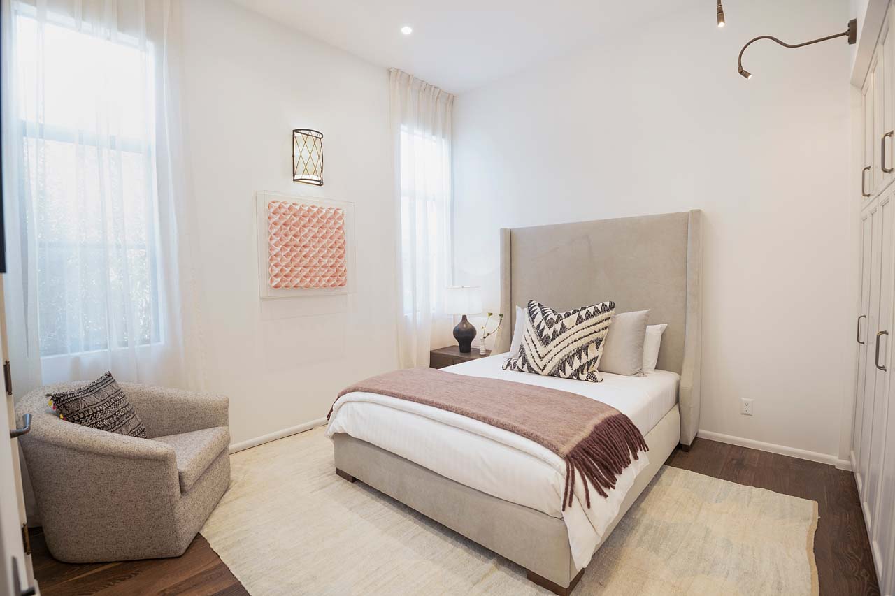 minimalist bedroom with ample storage space
